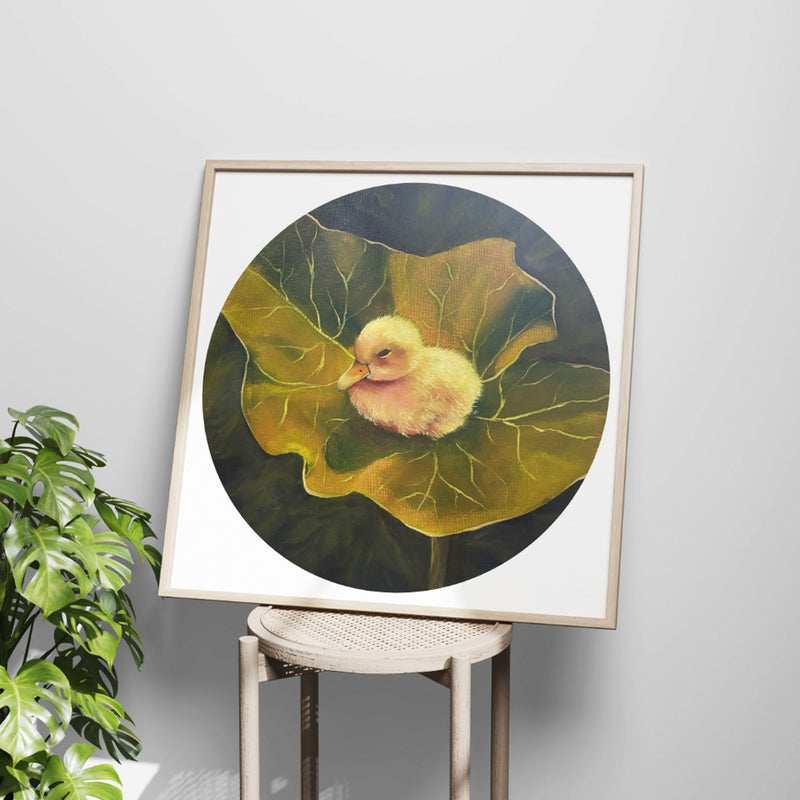A Little Duck art print — a little duck sat on a leaf by the pond