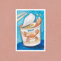 Cup Noodles at Midnight art print — a crab-print noodle cup with an egg on top, shown on a pink wall