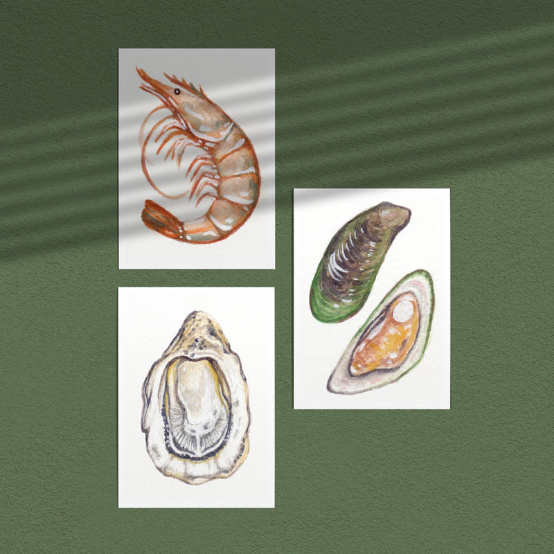 Seafood — a set of three seafood art prints hung together
